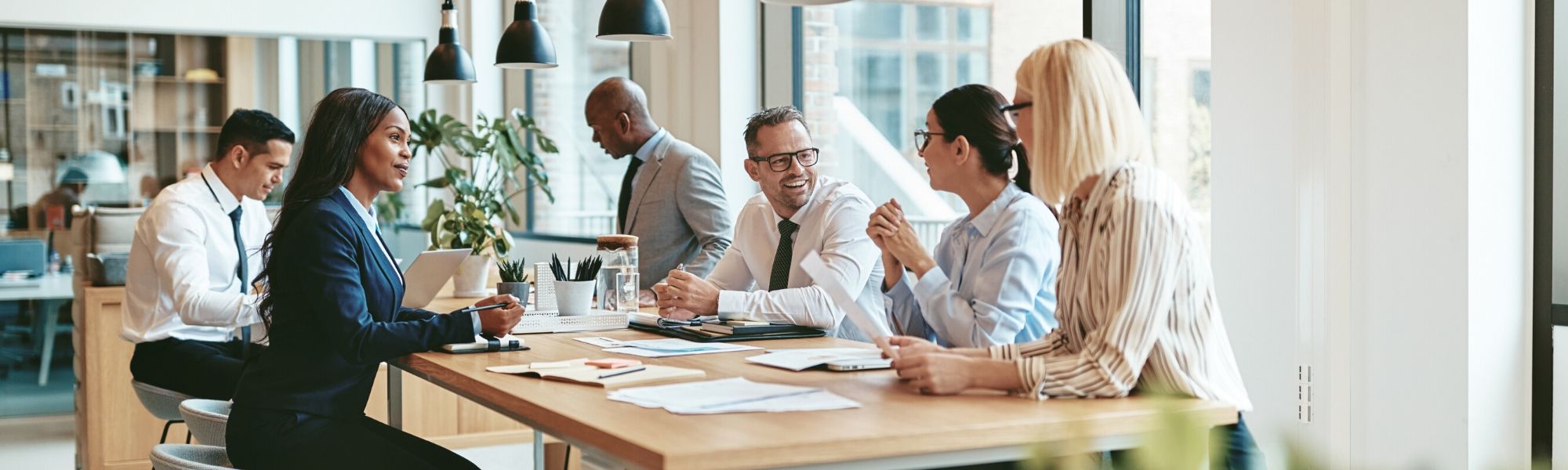 Office workers in conversation