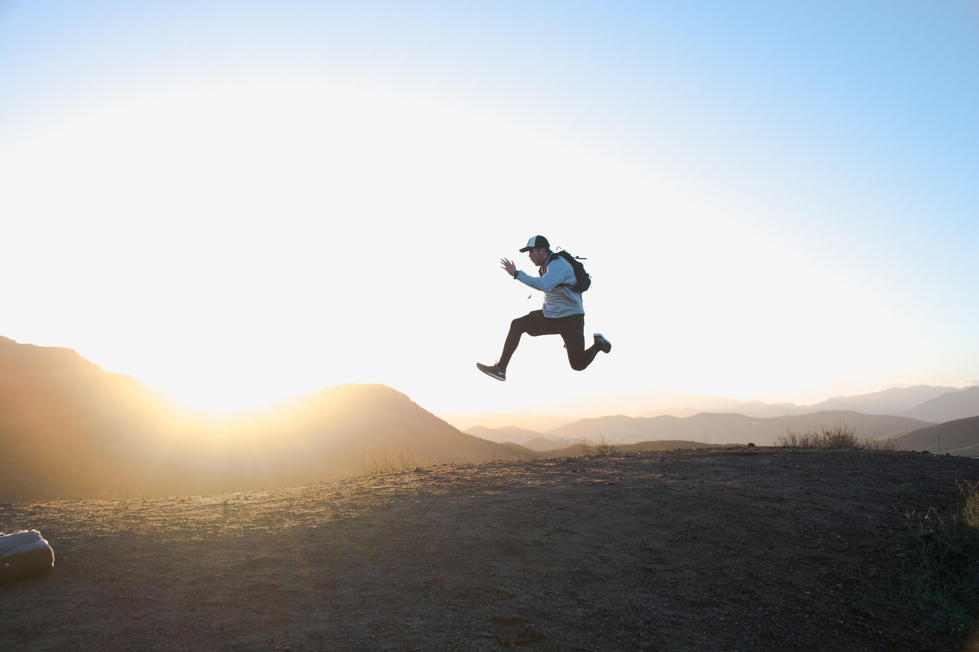 motivated employee jumping